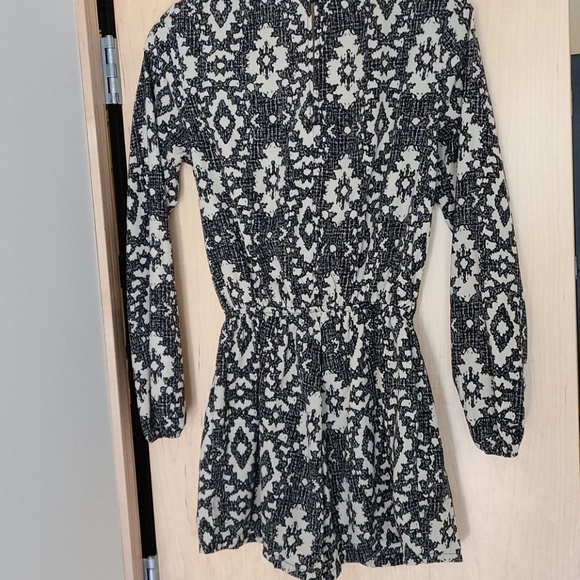 Tan and Black romper with zipper pockets - Picture 2 of 3